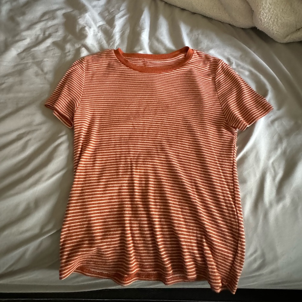 White / orange striped shirt